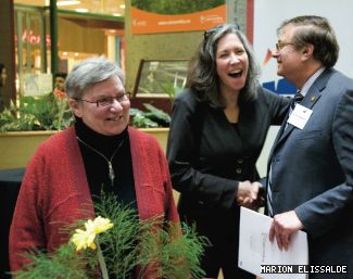 VP Research Louise Dandurand (left) and Acting Director of the Office of Research Carole Brabant congratulate the Director of the Centre for the Study of Learning and Performance, Philip Abrami, at a March 30 reception.